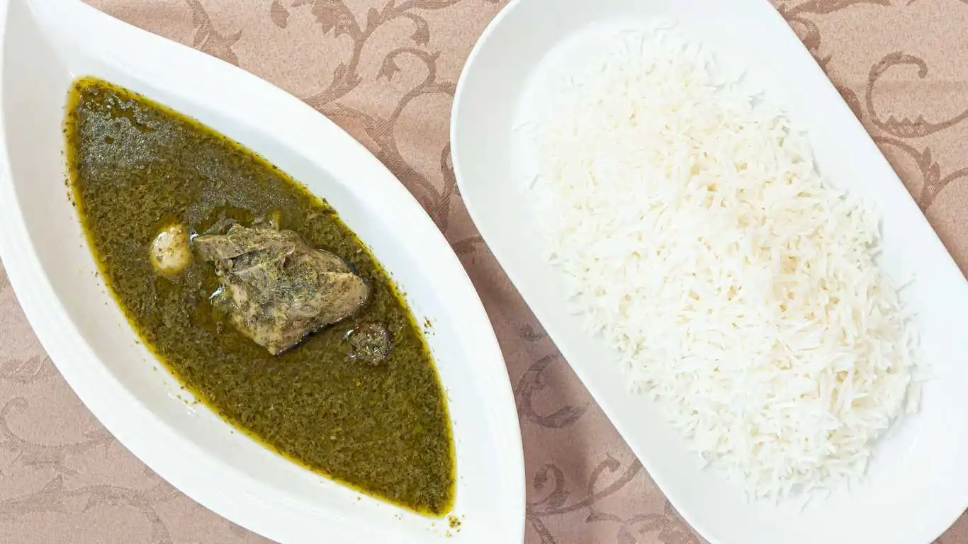 Quorma Sabzi With Rice And Salad at Kabul Restaurant in Calgary, AB
