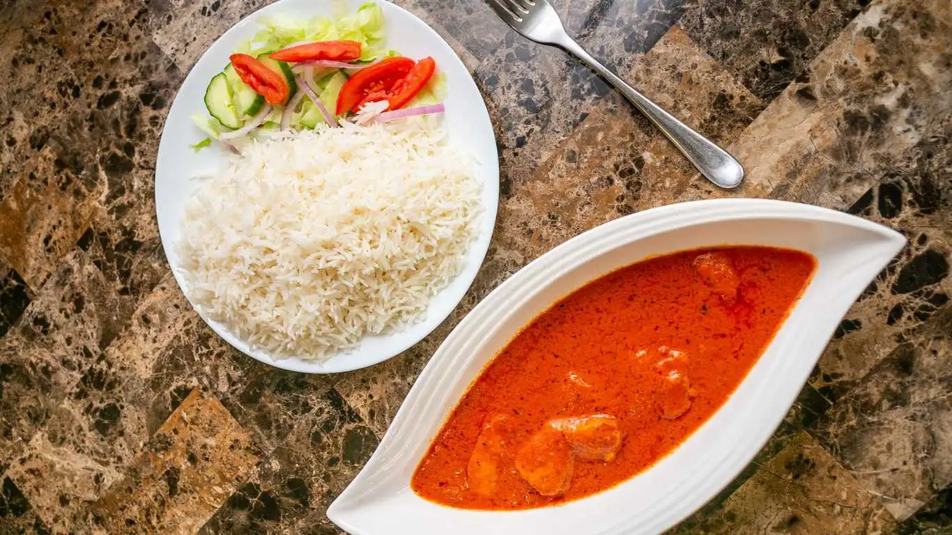 Butter Chicken With Rice at Kabul Restaurant in Calgary, AB